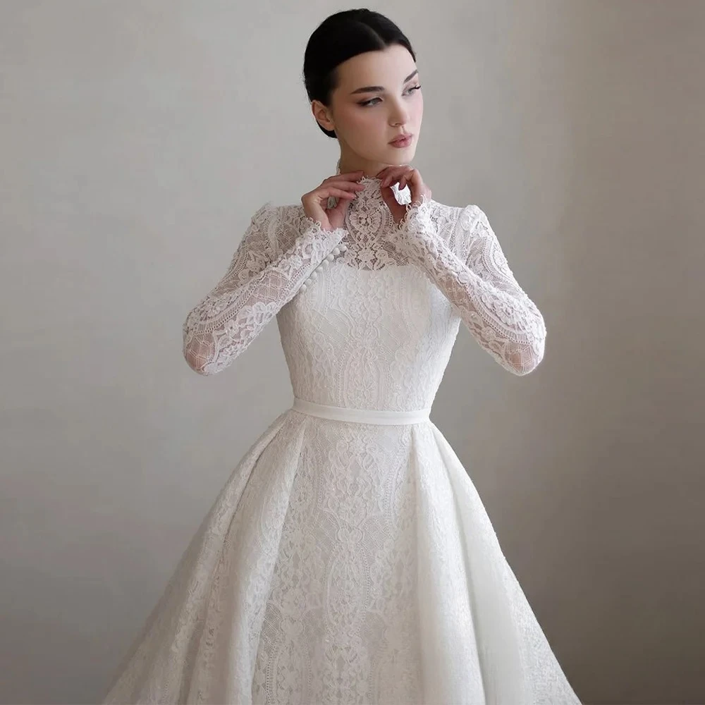 فستان زفاف فاخر مخصص برقبة عالية وأكمام طويلة ذيل محكمة فيستدو دي نويفا فستان زفاف دانتيل عربي تصميم خط