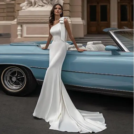 

Elegant Sleeveless Mermaid Wedding Dresses 2022 Sweep Train Bows Sashes Square Collar Covered Button Jersey Bridal Gowns