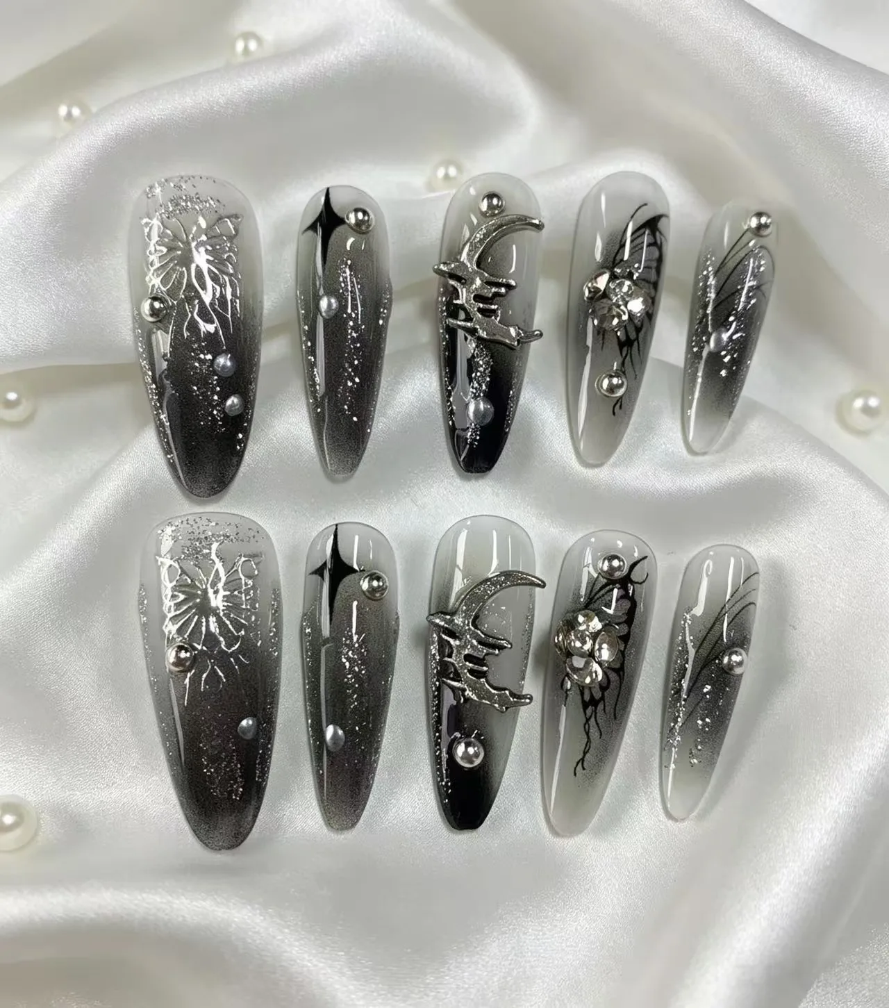 10 Pieces of Black-Gray Gradient Butterfly Star and Moon Press-On Nails, Semi-Transparent Gray-White Base Color with Vertical Smoky Black Gradient, Nail Surface Sprinkled with Fine Silver Glitter, Lik