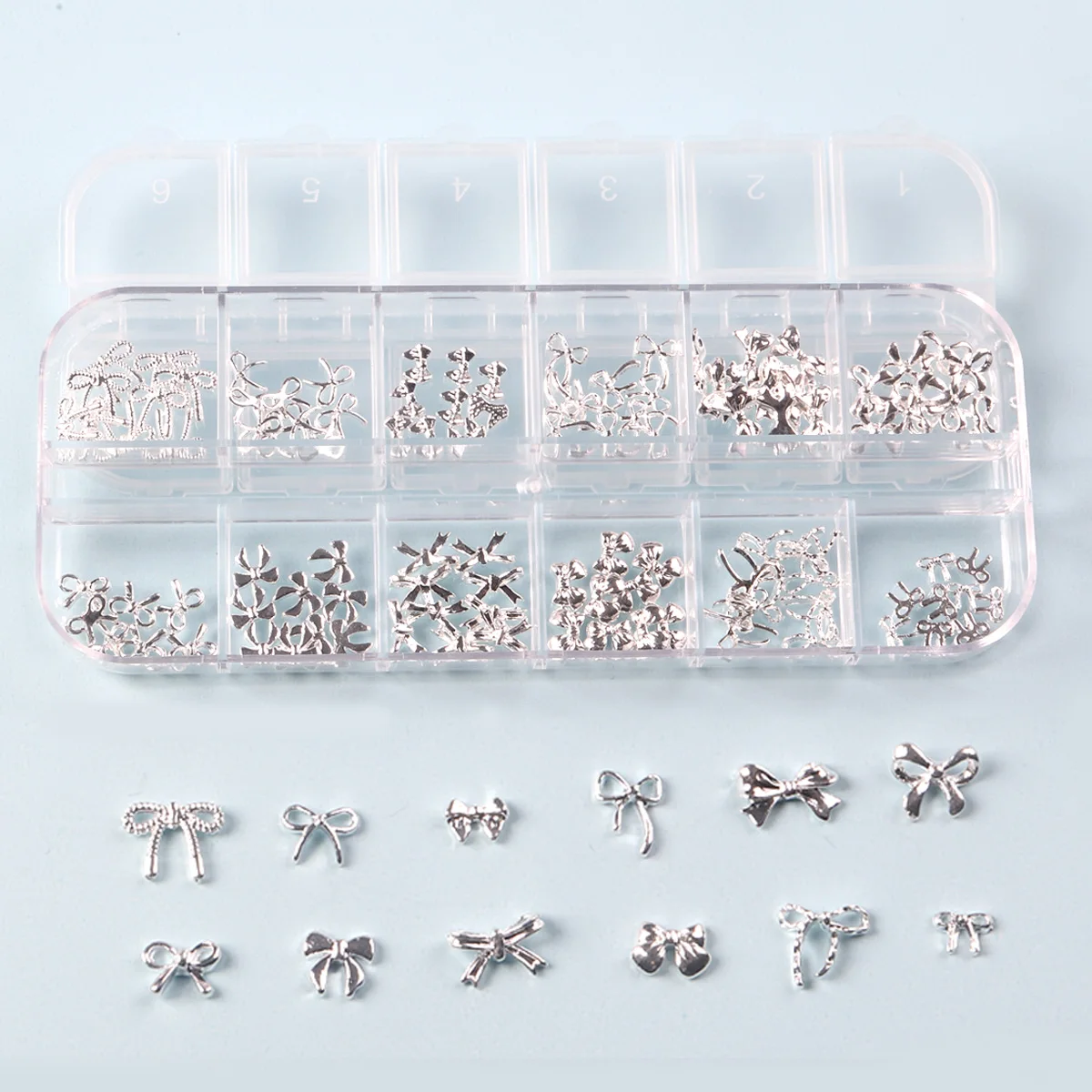 TSZS 12 Grids 3D Silver Bow Jewelry Nail Art Charms Mix Shape Bowknot Nail Charms Ribbon Nail Manicure Decoration