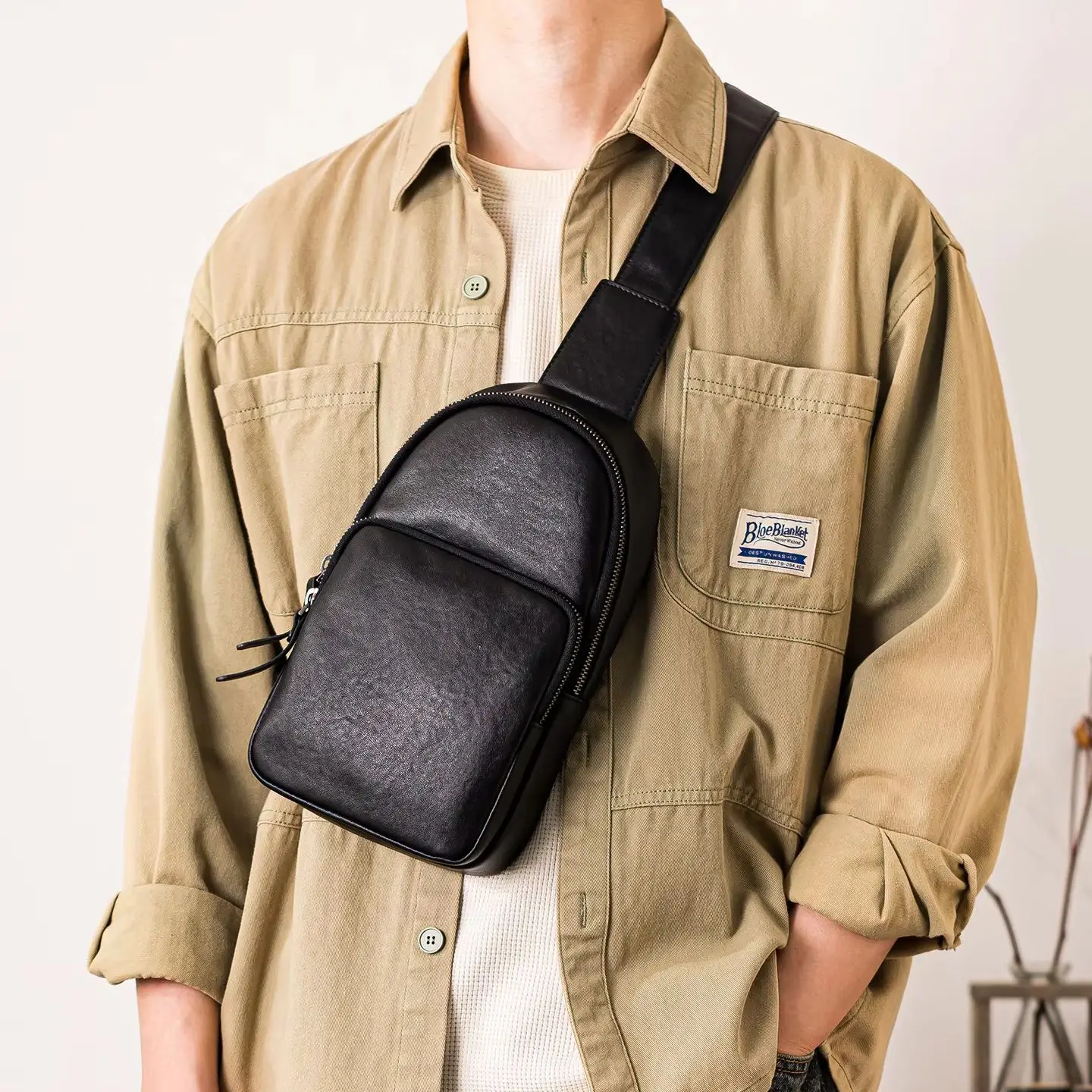 PNDME simple fashion designer handmade first layer cowhide men's small chest bag genuine leather black motorcycle crossbody bag