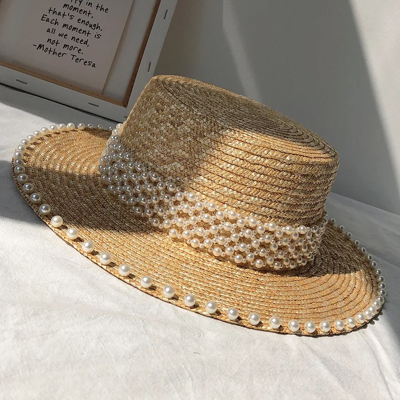 Handmade pearl straw flat straw hat women\'s summer beach holiday sun protection hat stylish and elegant Hepburn style top hat
