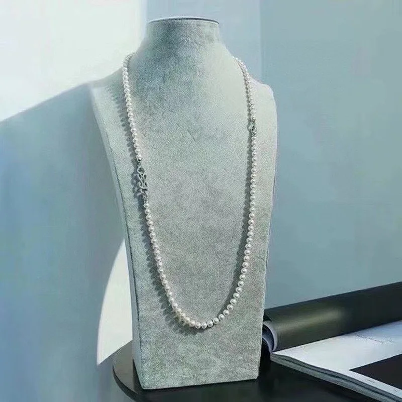 Stylish natural freshwater pearl necklace with detachable links offering multiple ways to wear it perfect as a sweater chain