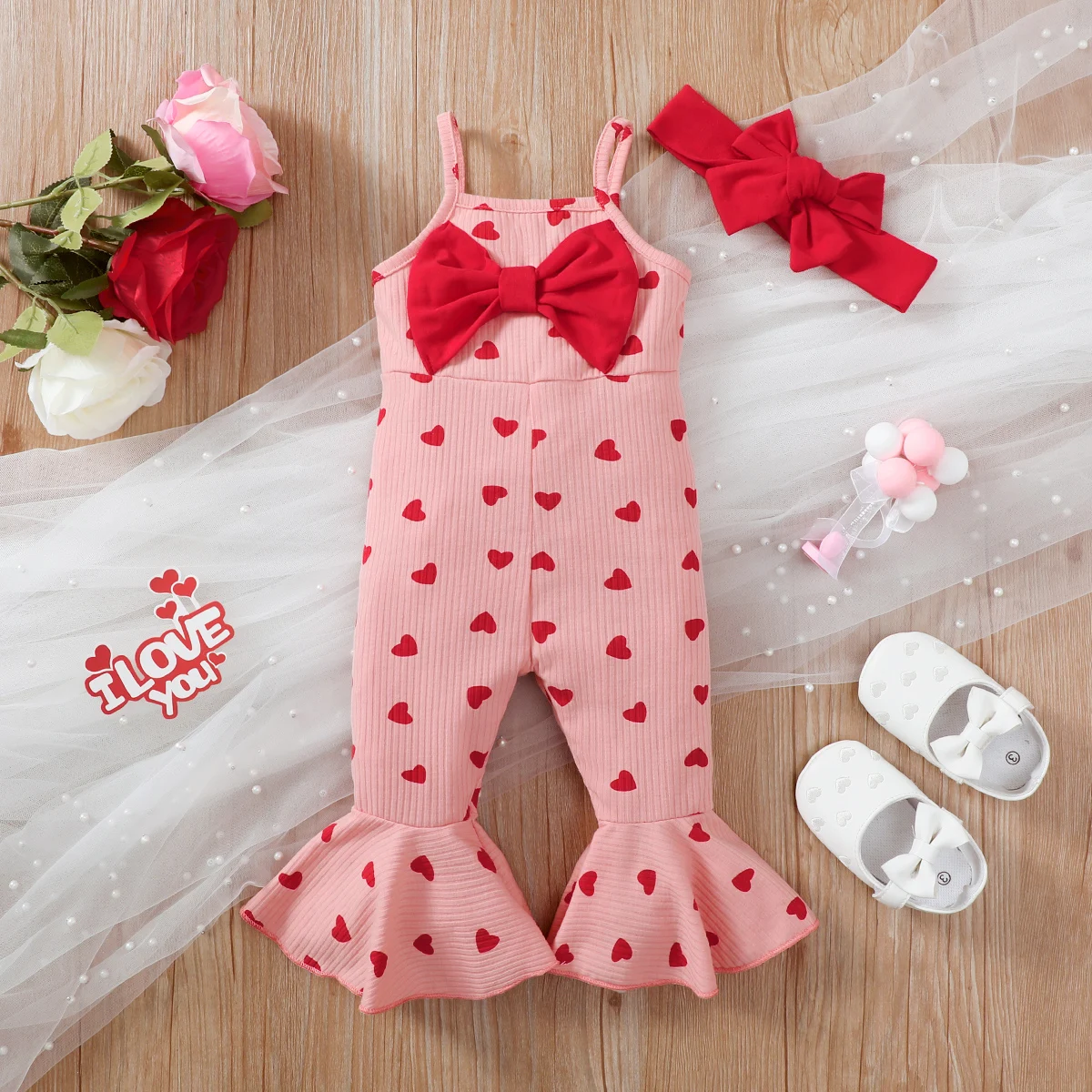 PatPat 2pcs Baby Girl Allover Heart Print Bow Front Bell Bottom Ribbed Cami Jumpsuit & Headband Set