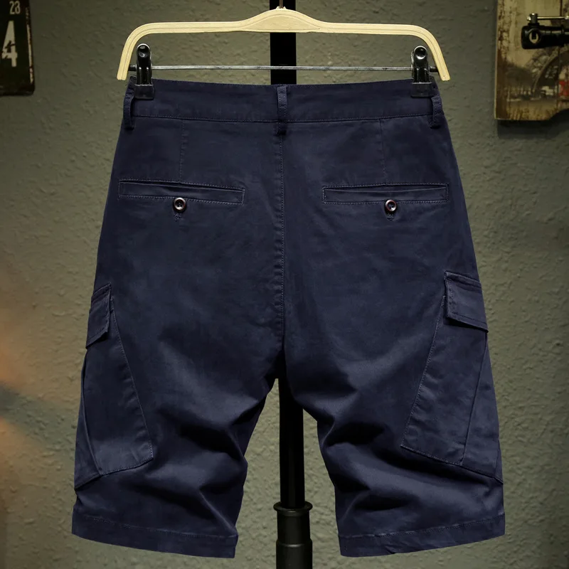 новые хлопковые эластичные рабочие брюки с несколькими карманами для мужчин, свободные прямые брюки, универсальные для молодежи, деловые и повседневные тонкие шорты.