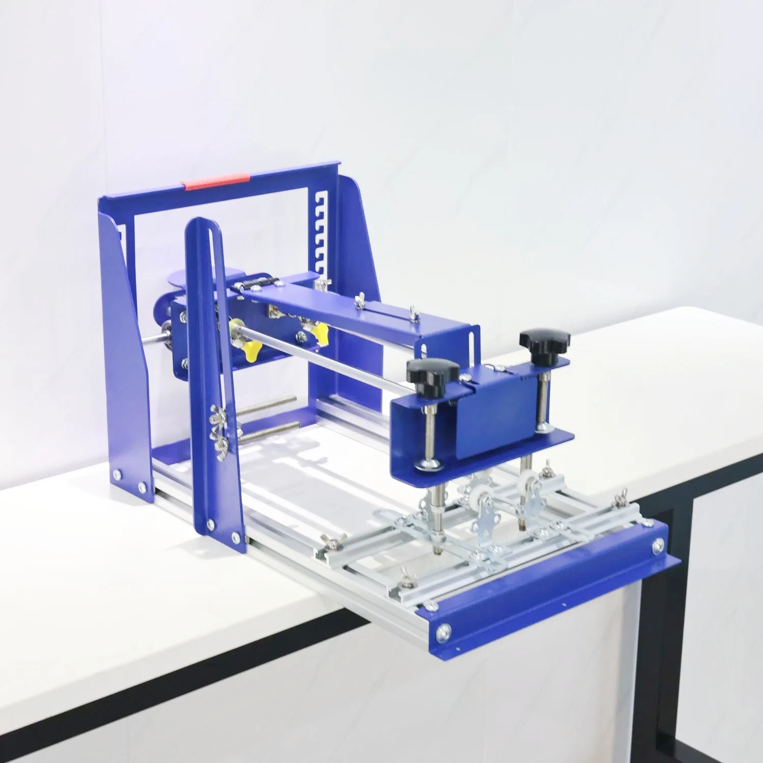 

DL-qm-001 Curved screen printing machine, manual circular bottle curved printing table, screen printing cup, cylindrical cone