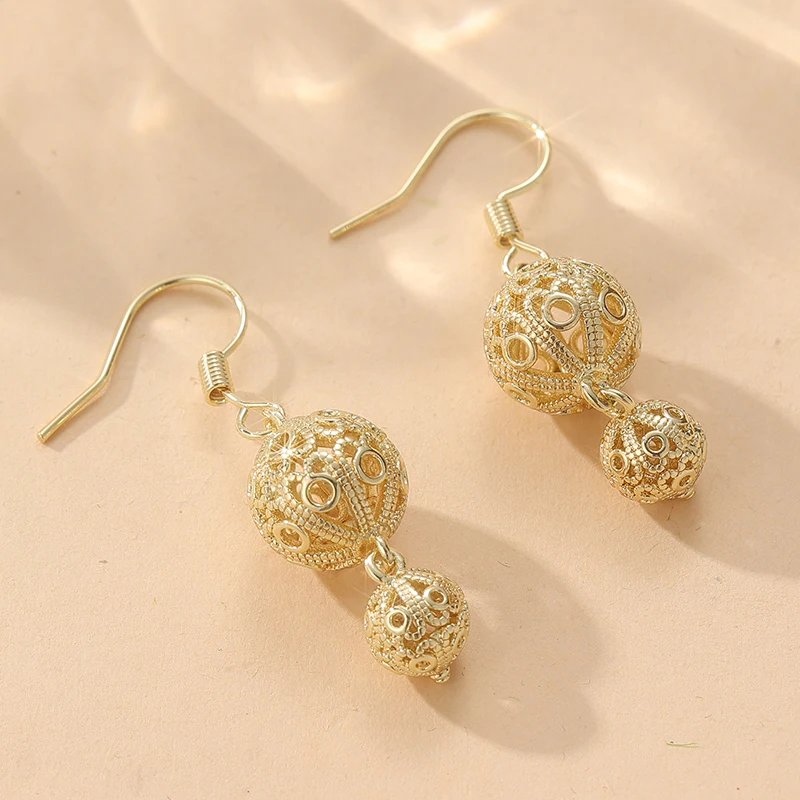 Unique Retro Hollow Carving Ball Dangle Earrings For Women Gold Color Vintage Pendant Earrings Court Style Fashion Party Jewelry