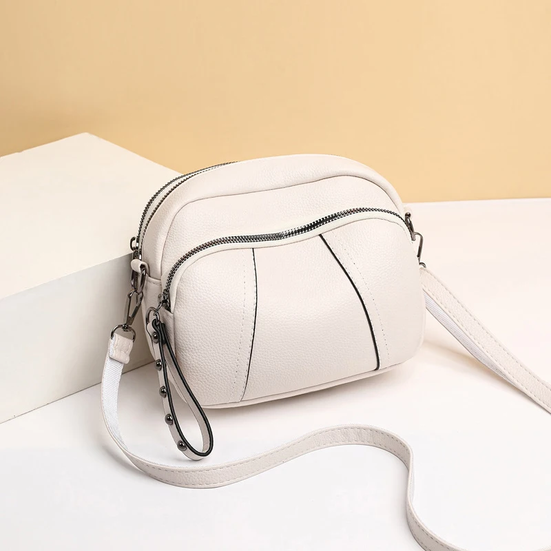 Einfarbige modische Niet Reiß verschluss Damen Handy tasche einfache weiche Leder Schulter Cross body kleine quadratische Tasche Handtasche – Detail 15