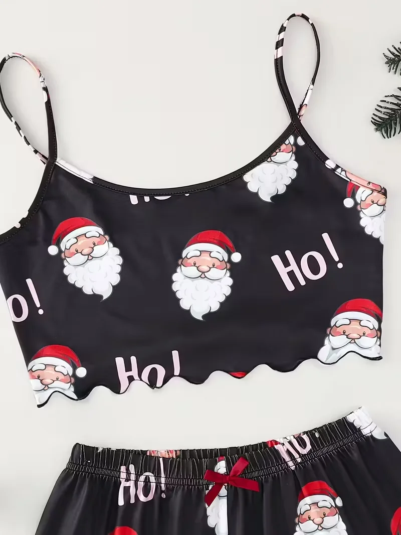طقم بيجامة نسائي مطبوع عليه سانتا لعيد الميلاد مع حزام سباغيتي وسروال قصير برقبة دائرية بدون أكمام