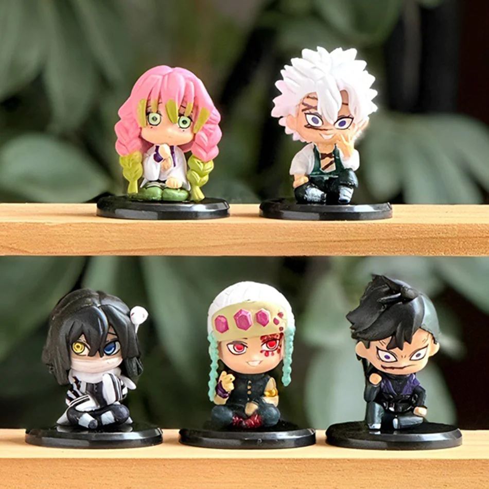 Figuras de acción de Kimetsu no Yaiba, versión Q, con los personajes Tanjiro, Nezuko, Zenitsu e Inosuke, y Rengoku, hechas de PVC, ideales como regalos coleccionables.