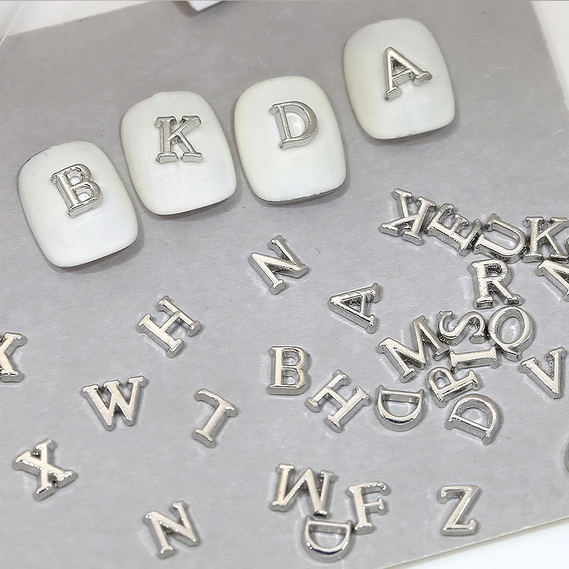 26 قطعة معدنية 26-الأبجدية ثقب حلقة مسمار سحر الذهب/الفضة الإنجليزية إلكتروني سبيكة الراين جوهرة DIY بها بنفسك ثلاثية الأبعاد مسمار الفن الديكور