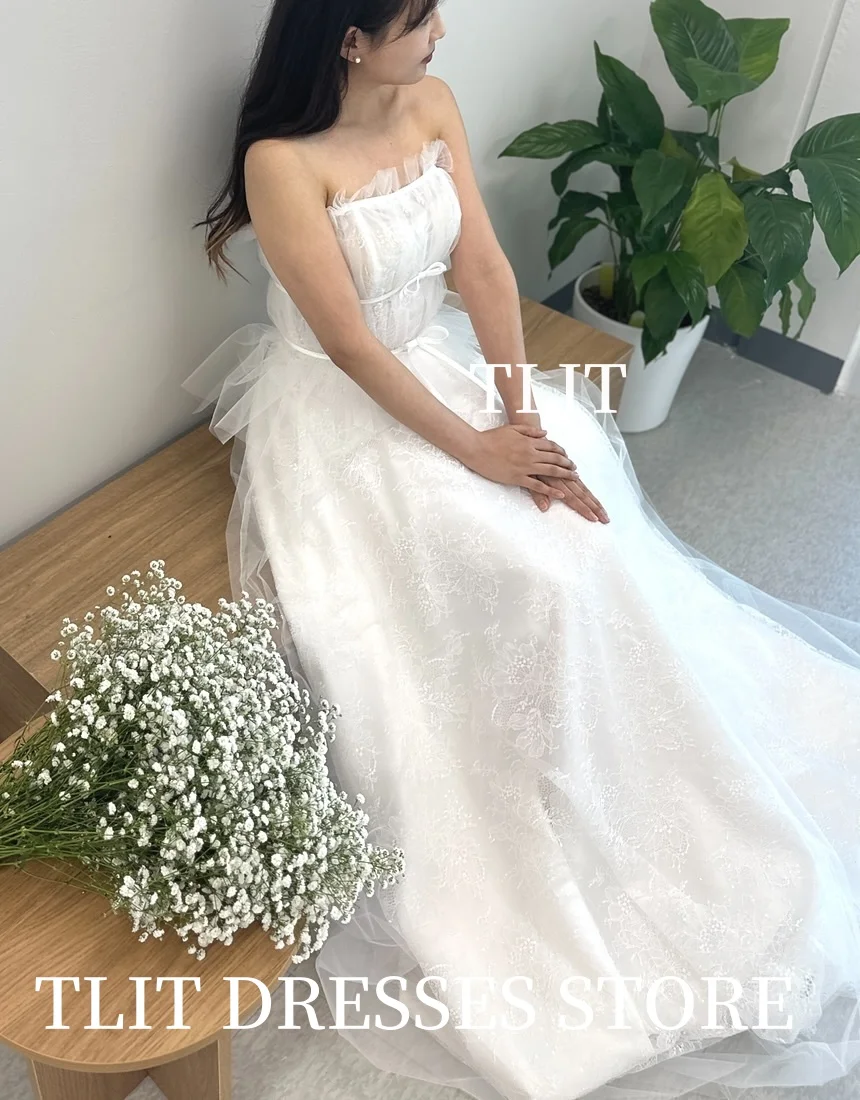 TLIT Elegante weiße Seidentüll-Hochzeitsparty-Kleider Korea Fotoshooting Drapierte trägerlose Schleifen Brautkleider Maßgeschneiderte formelle Frauen