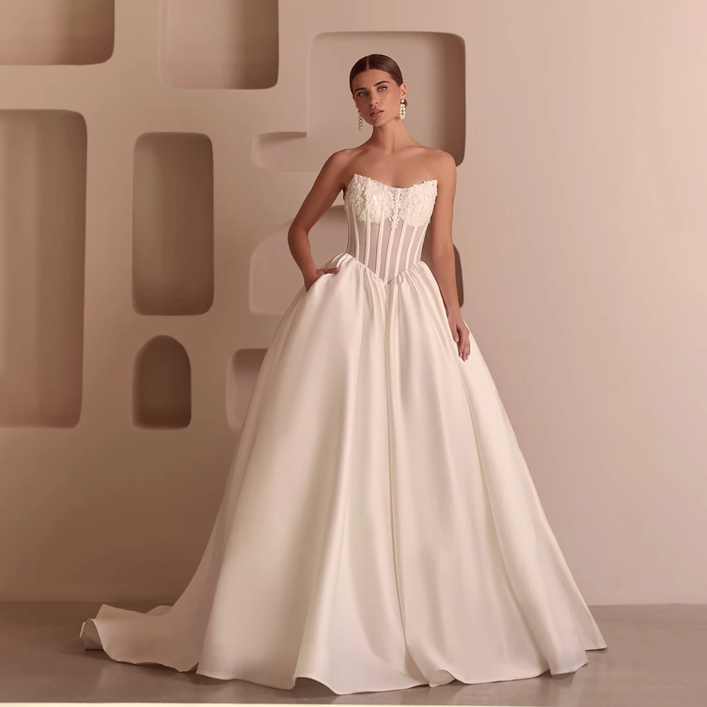 

Customized Strapless Boat Neck Appliques Corset Satin A-Line Wedding Dress with Lace-Up Back Floor Length Sweep Train for Bride