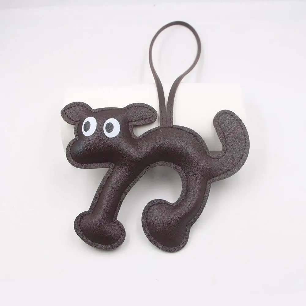 Porte-clés créatif en cuir en forme de chat pour hommes, porte-clés de voiture, breloque de sac de chien teckel, pendentif de téléphone, noir, marron, bijoux animaux mignons, cadeaux