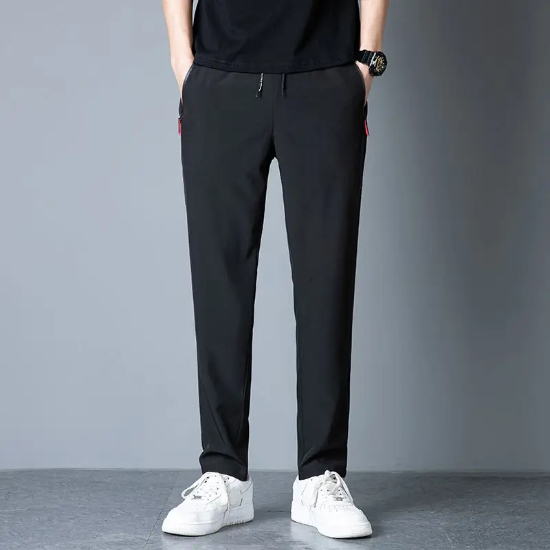Men's casual pants straight leg slim fit elastic waist jogging pants Korean classic blue black gray men's pants plus size 4XL5XL