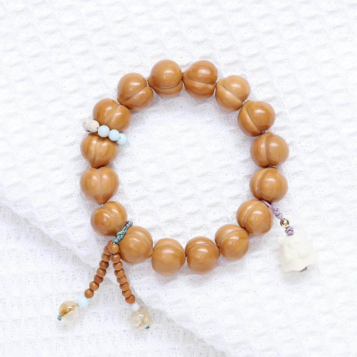 pulseira-de-oracao-e-presente-para-mulheres-com-pedra-natural-bodhi-cabeca-de-macaco-e-bumbum-de-pessego-com-bencao-lunar