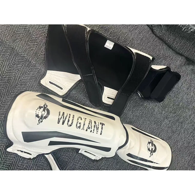 

Тхэквондо Санда Боксерские щитки для ног Боевые искусства щитки для голени Профессиональное оборудование для тайского бокса BJJ MMA Спарринговое тренировочное снаряжение для взрослых