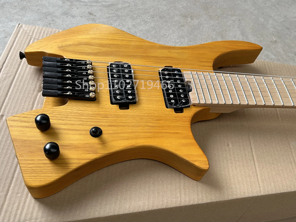 Factory Headless 7 Strings Electric Guitar Ash Body Matte Yellow Fanned Maple Fretboard Customizable