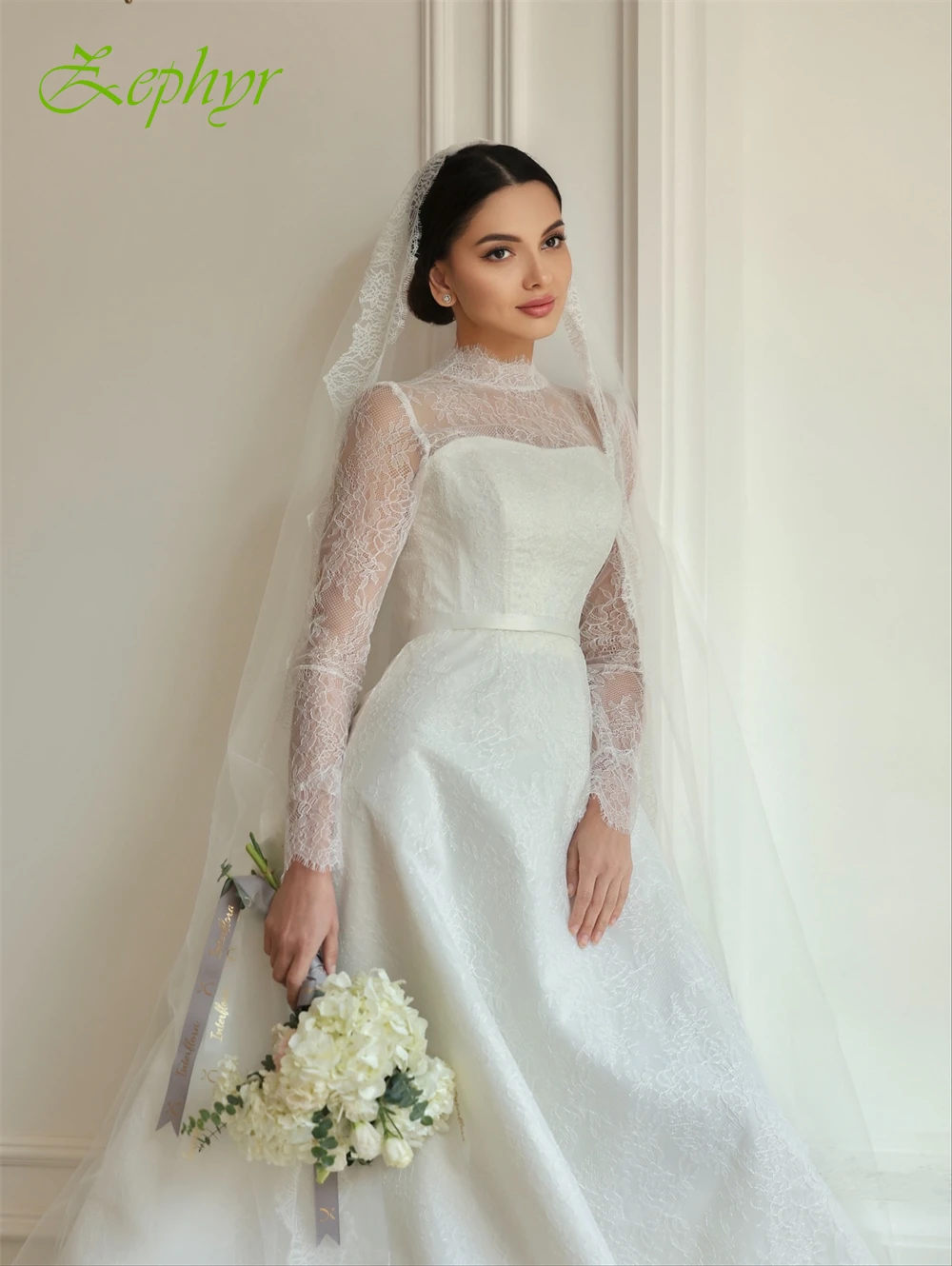 فستان زفاف من الأورجانزا الأبيض الناعم حسب الطلب كلاسيكي برقبة دائرية وأكمام طويلة زي العرائس حالمة على شكل حرف a ذيل شابيل فيستدو دي نوفيا