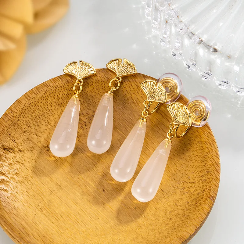 

The new fashion Chinese-style lotus fan shell, long and exquisite tassel pendant ear stud and ear clip are women's ethnic-style