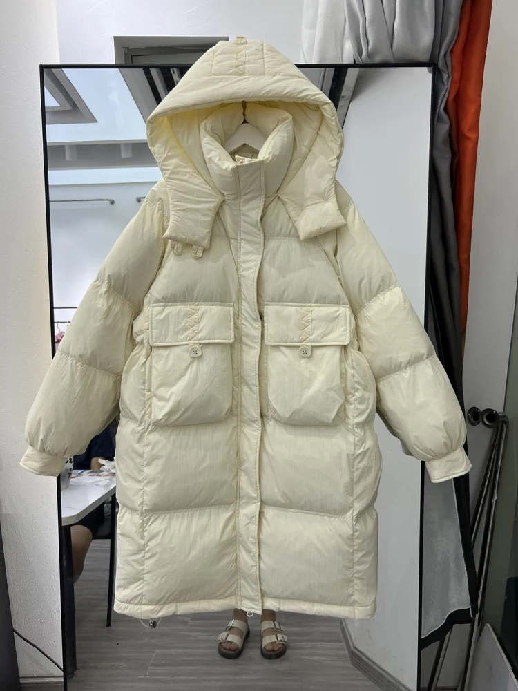 Piumino lungo sopra il ginocchio da donna vestibilità ampia invernale nuova versione coreana addensato versatile casual piumino d'anatra bianco