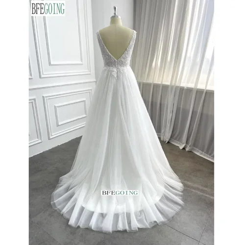 Imagen 2 del producto Vestidos de novia de una línea de tul de encaje Cola capilla Vestidos de novia sin mangas hasta el suelo personalizados