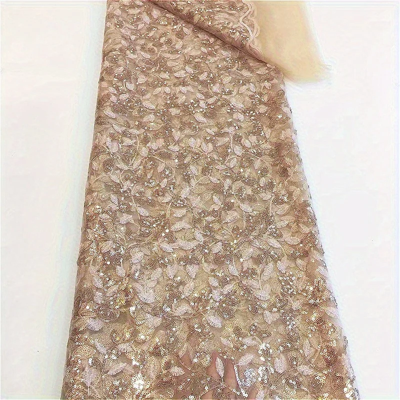 

Don't miss out! 5 yards of black, blue, green and red lace fabric with leaf designs, suitable for sewing gowns.