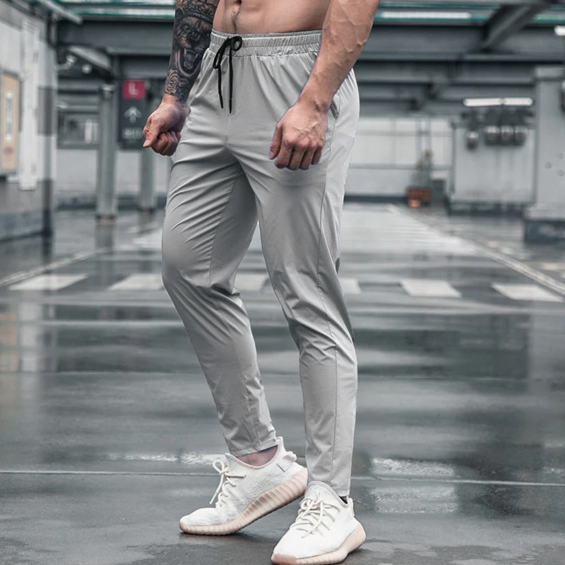 Mannen Sport Broek Met Zakken Running Workout Broek Quick Dry Training Jogger Joggingbroek Hoge Kwaliteit Fitness Bodems