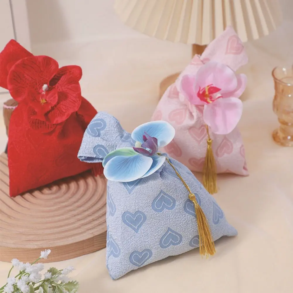 Borsa da polso con nappa a fiori in velluto Borsa per trucco per orchidee Borsa in stile cinese Temperamento Imballaggio di gioielli Scatola di zucchero festosa Capodanno