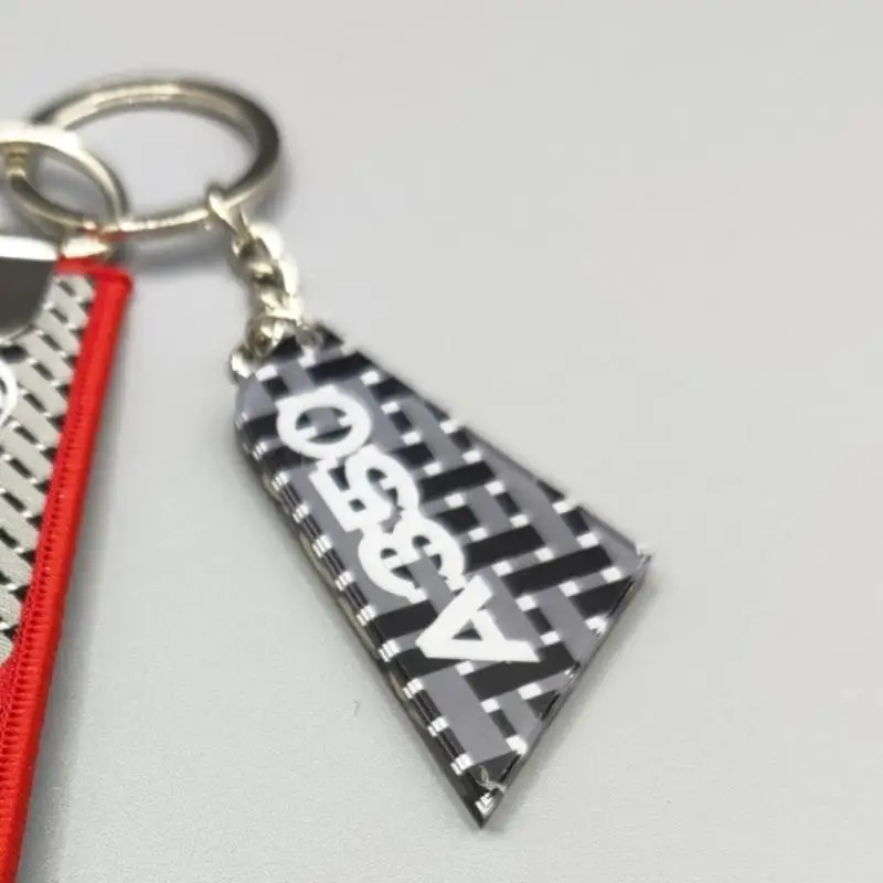 1 قطعة كلا الجانبين طباعة الاكريليك نمط الطيران العمودي الذيل علامة السيارة مفتاح الملحقات الطيران المفاتيح حقيبة الظهر قلادة