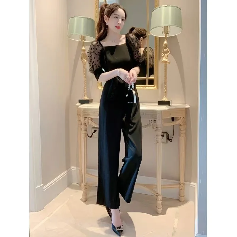 Tuta nera di fascia alta Tuta estiva sottile da donna con maniche a sbuffo Tuta elegante slim con top a tubo lungo