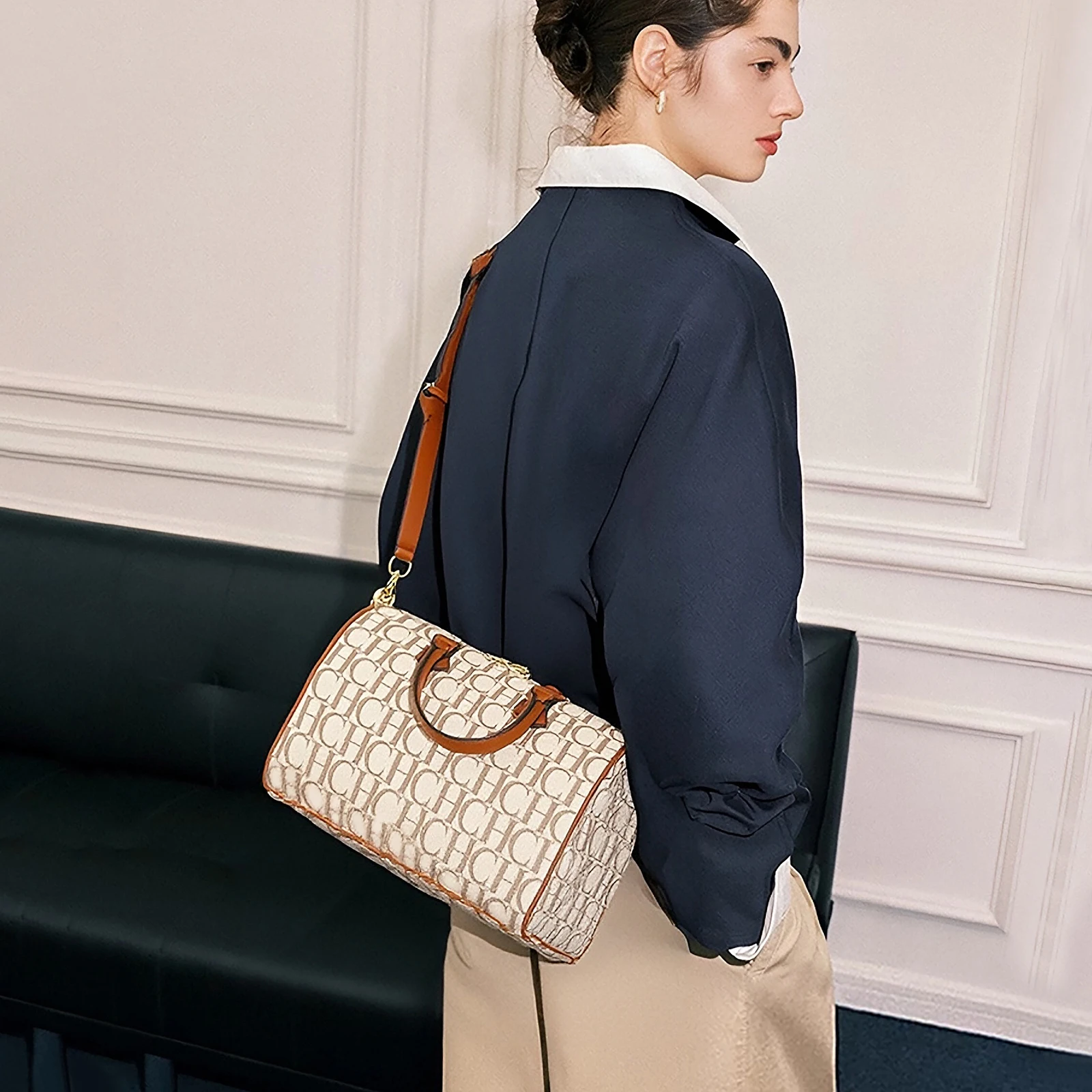 Silver-Gold Dual-Tone Textured Tote Embossed Grid Front Angled Silhouette Strap  Modern Avant-Garde Urban Utility