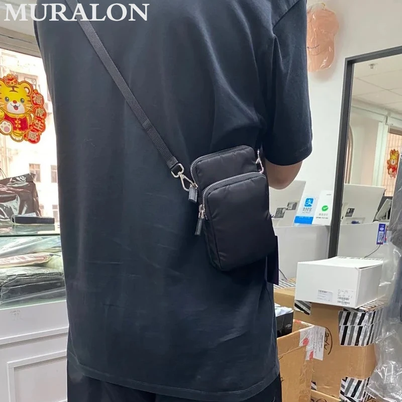 Nylon splicing couro bolsa de couro para homens e mulheres, mini bolsa crossbody, luxo simples lazer multifunções pequena bolsa de ombro