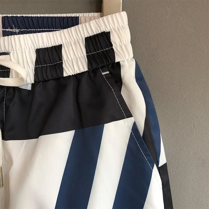 夏の新装飾カジュアルトラックパンツワイドレッグメンズファッション脚ハルンパンツ韓国多用途レギンス紳士服ヒップホップ