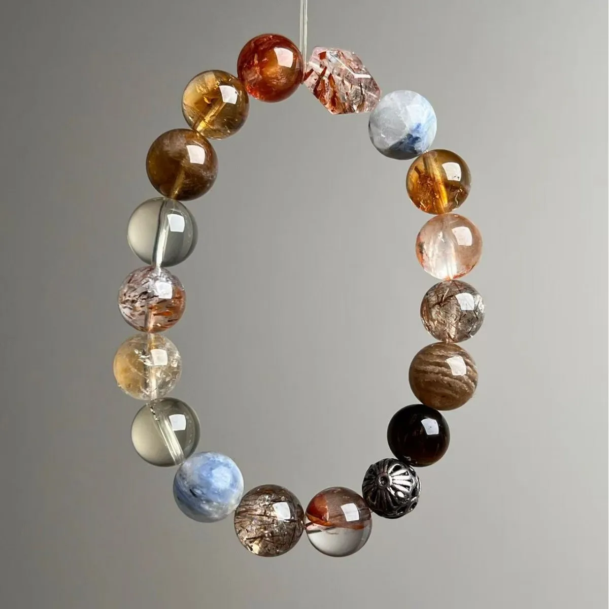 

Natural Duobao Bracelet, Yellow Tower Crystal, Ghost Glue Flower, Black Gold Super Seven, Women's Light Luxury Fashion Bracelet.