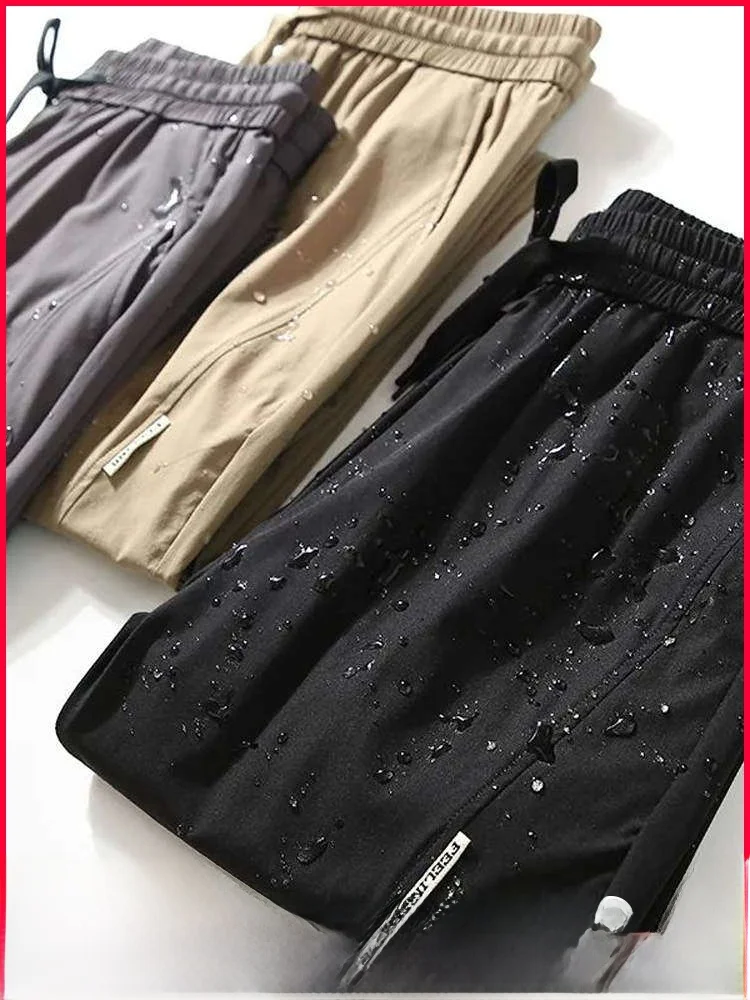 

Мужские модные спортивные повседневные брюки свободного покроя с лазерной перфорацией, дышащие, водонепроницаемые, прямые брюки со средней талией, длинные брюки...