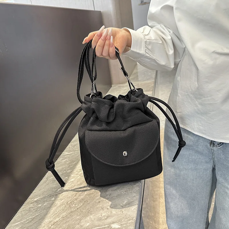 

2025 Spring Favorite! Women's Simple Canvas Drawstring Bucket Bag, Wide Strap Crossbody, Stylish & Versatile