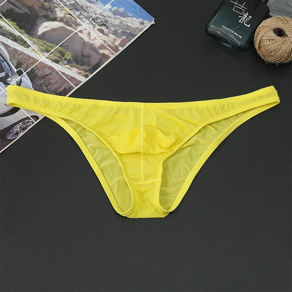 

Sexy Men Ultra Thin Underwear Low Waist Seamless Briefs Hip Lifting Solid Color Youth Ice Silk Transparent Breathable Panties