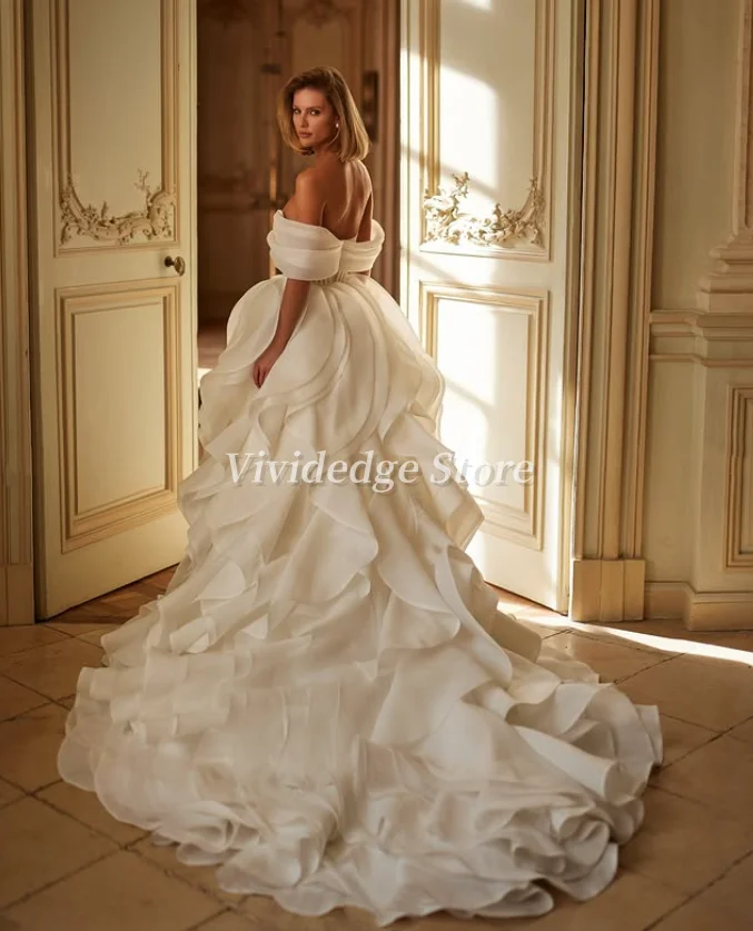 Robes de mariée blanches élégantes sans bretelles personnalisées, ourlet ondulé, robes de mariée à la mode, 2025