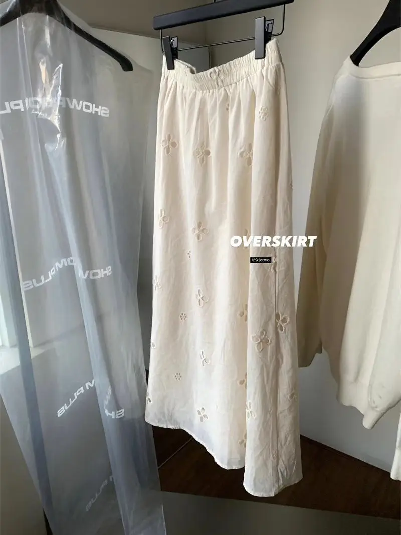 Gonna beige ricamata cava per donna in estate Bella gonna lunga sottile Gonna a trapezio francese Piccola fata