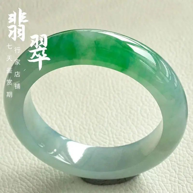 Ice green jadeite , noble concubine bracelet, oval-shaped, wide band with floral patterns, artistic retro style