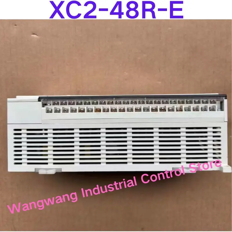 

Подержанный тест ОК, программируемый контроллер XC2-48R-E