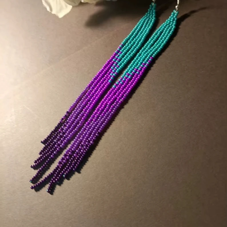 ZGMXR Rice bead earrings Tassel Bohemia Alloy Hand-woven Original female Simple Gradient color Fashion Beaded earrings