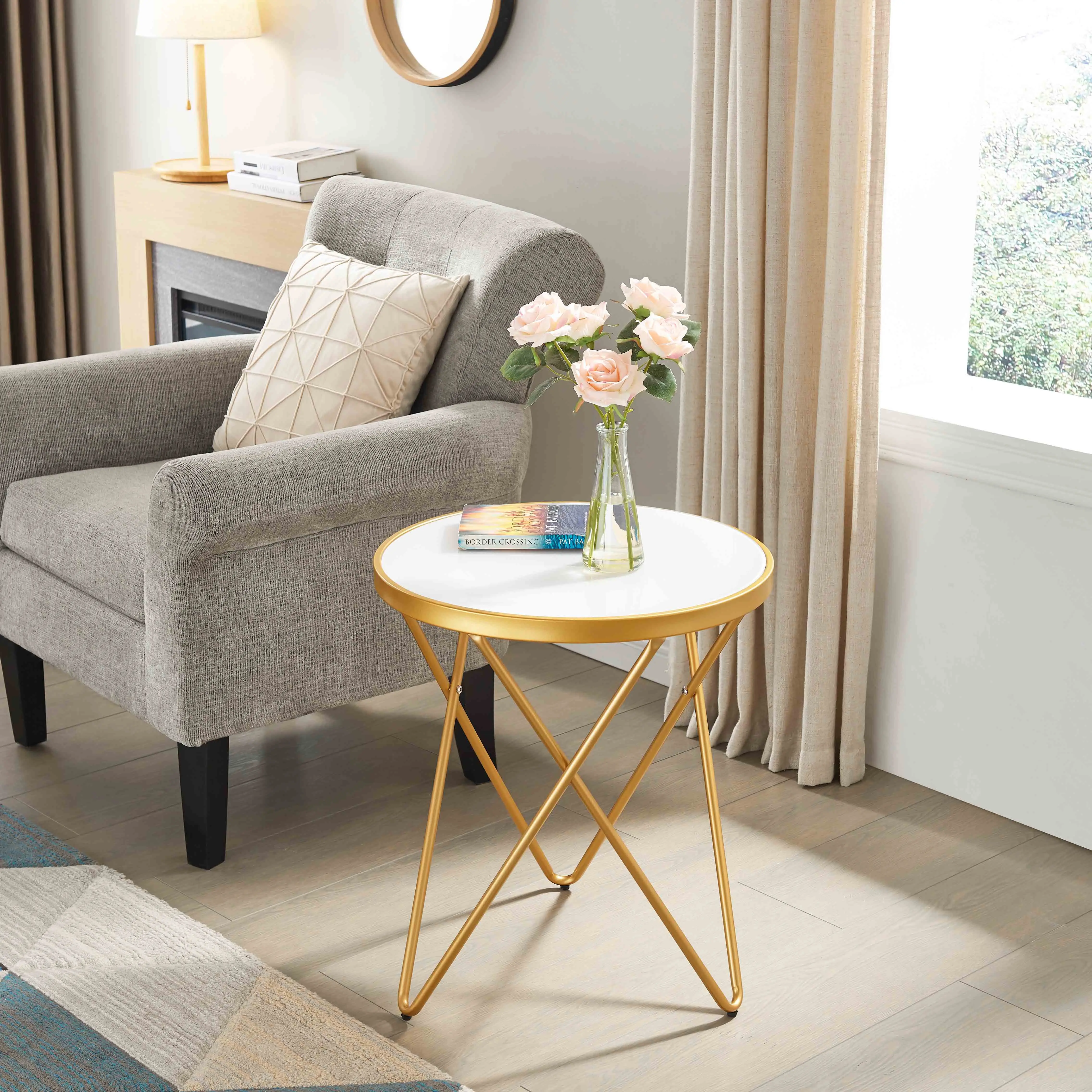 

Modern Sleek Metal Frame Round Coffee Table with Glass Living Room Centerpiece or Dining Room Furniture for Home or Hotel Use