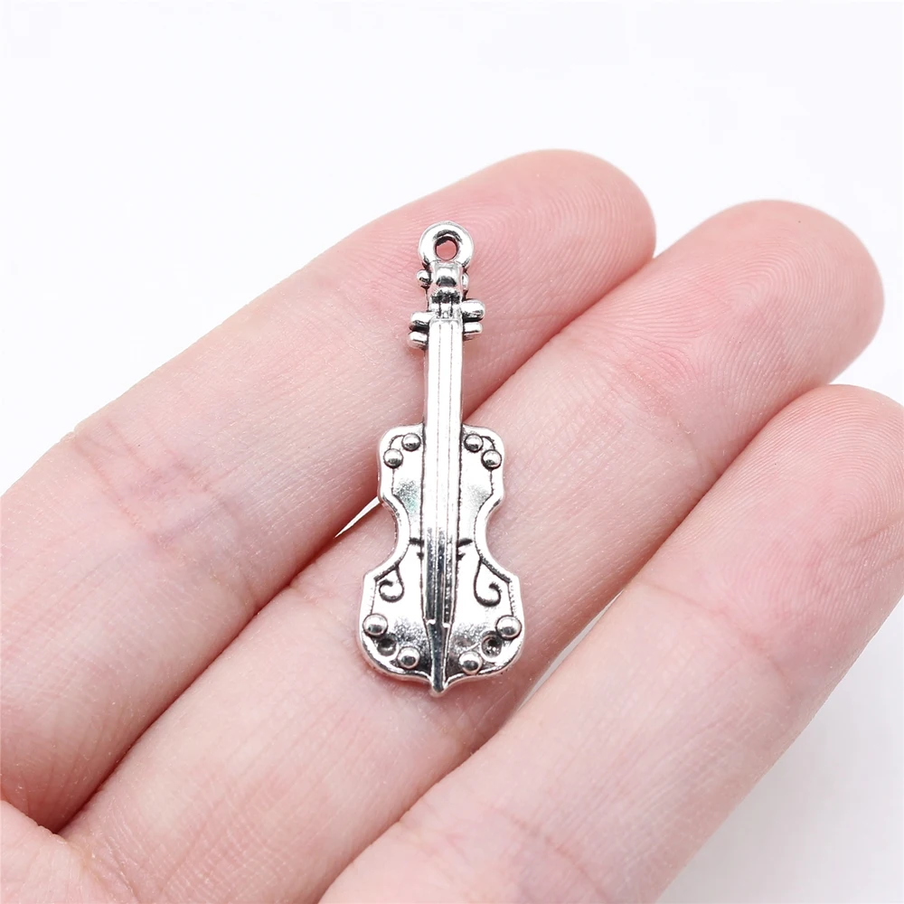 WYSIWYG 10 ciondoli per violino color argento antico da 31x11 mm per la creazione di gioielli