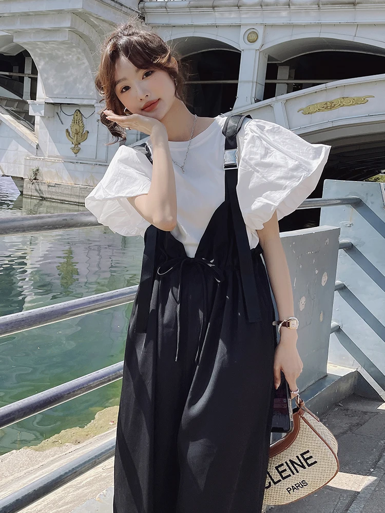 طقم جمبسوت نسائي عالي الخصر وواسع الساق مكون من قطعتين لصيف 2025 تي شيرت كوري جديد فضفاض مع لوتس لو سويس