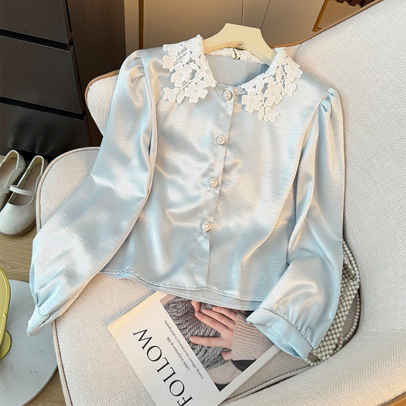

Elegant Satin Spliced Lace Shirt Women French Style Summer 2025 Doll Collar Pearl Single Breasted Light Luxury Long Sleeve Tops