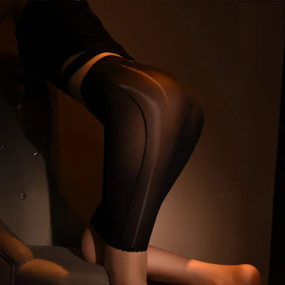 女性のセクシーな透明オイルシニーミニスカートショートボディコンイブニングパーティークラブウェアストレッチタイトスカートドレス女性服