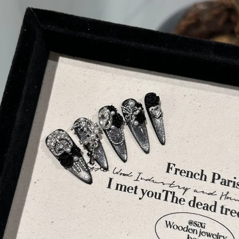 

10PCS Black Camellia Press on Nails Long Stiletto Silver Cat Eye Glow White Base Luxury Elegant False Nail Handmade Nails Ноготь