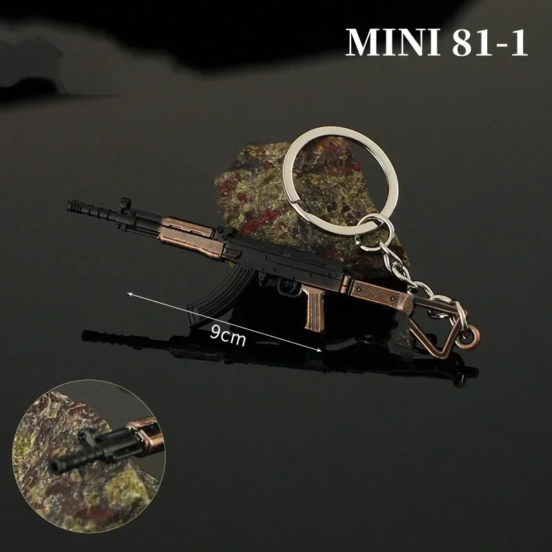 Nova arma de metal chaveiro pubg ak 47 mini glok arma modelo liga pistola luz chaveiro pingente presente brinquedo coleção